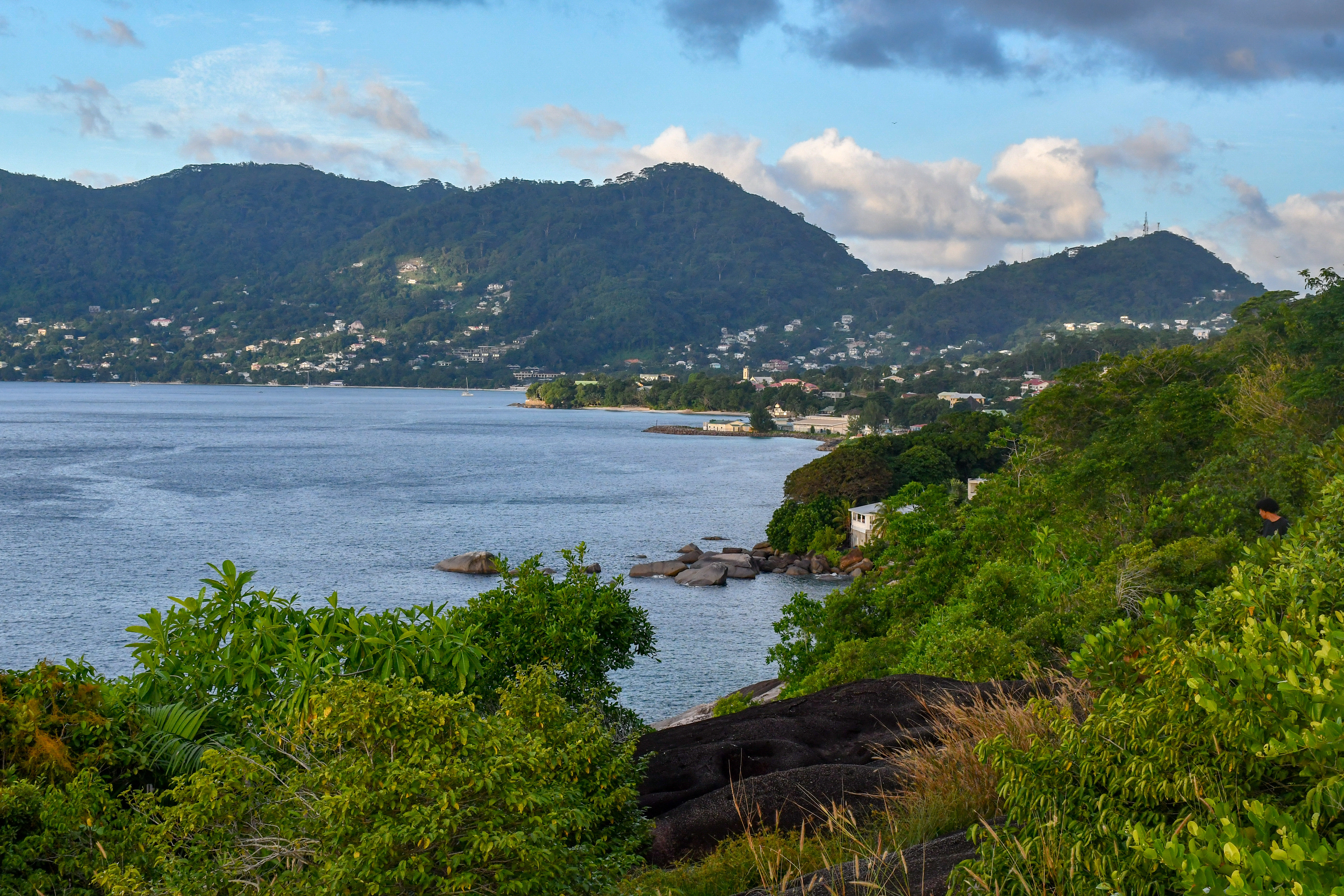 undp-mru-seychelles-1.jpg a body of water with a mountain in the background